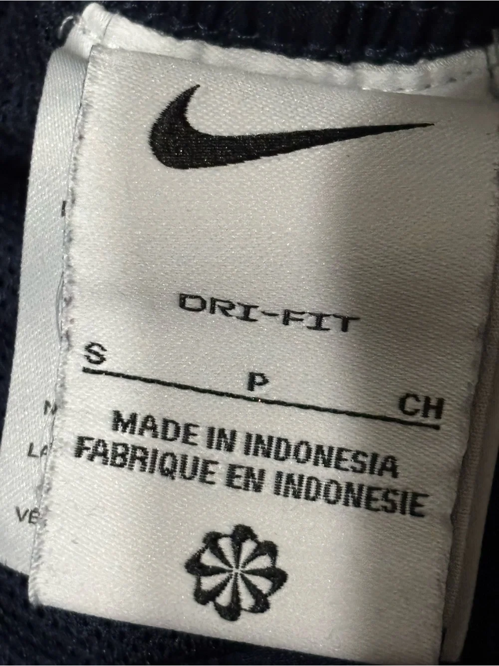 Nike White Tag with Black Swoosh and Text